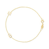 A yellow gold Custom Gold Bracelet - 2 Letters (with the letters M and B) on a white background. 