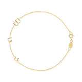 A yellow gold Custom Gold Bracelet - 3 Letters (B, F and F) on a white background. 