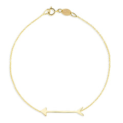 A Straight as an Arrow Bracelet in yellow gold on a white background. 