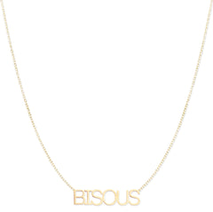 A BISOUS Necklace on a white background. 