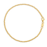 A Diamond Cut Bracelet in yellow gold on a white background. 