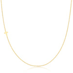A yellow gold 14k Gold Asymmetrical Charm Necklace - Cross with a bead chain on a white background. 