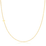 A yellow gold 14k Gold Asymmetrical Charm Necklace - Cross with a cable chain on a white background. 