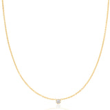 A yellow gold Diamond Layering Necklace on a white background. 