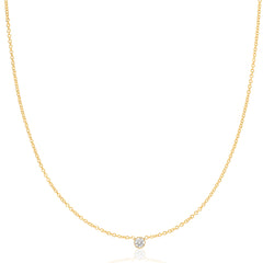 A yellow gold Diamond Layering Necklace on a white background. 