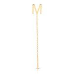 A yellow gold threader earring with a letter M stud on a white background.