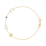 A yellow gold Custom Gold Bracelet - 4 Letters, with two letters C and S, an amethyst birthstone and a heart charm, on a white background.
