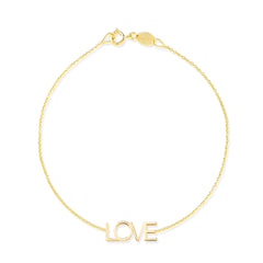 A yellow gold Love Bracelet on a white background. 