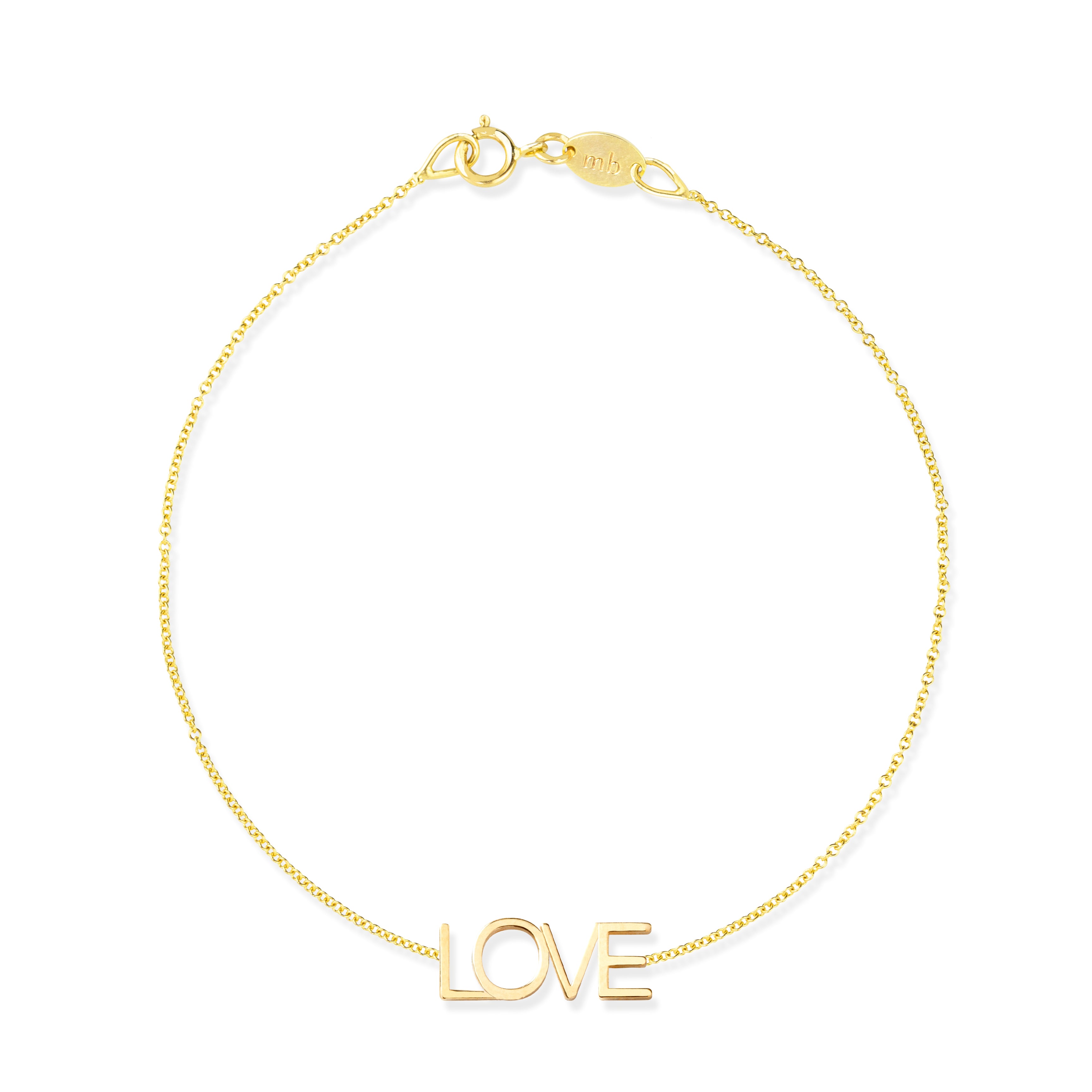 A yellow gold Love Bracelet on a white background. 
