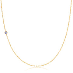 A yellow gold 14K Gold Asymmetrical Birthstone Necklace - Tanzanite (December) on a white background. 