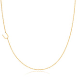A yellow gold necklace with a U letter charm on a white background. 