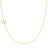 A yellow gold necklace with a W letter charm on a white background. 