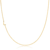 A yellow gold necklace with a L letter charm on a white background. 