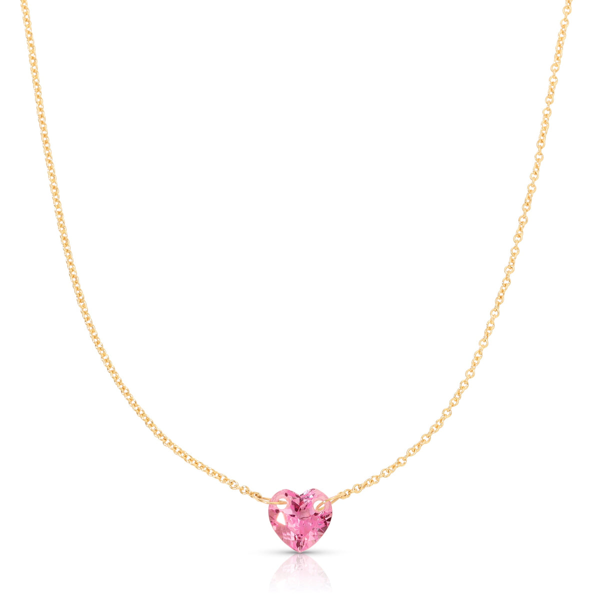 The Sweetheart Necklace - Pink Sapphire in yellow gold on a white background. 