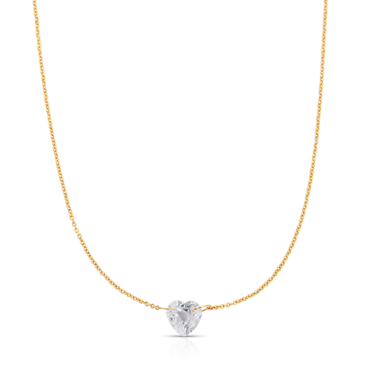The Sweetheart Necklace - White Sapphire in yellow gold on a white background. 