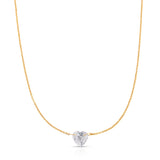 The Sweetheart Necklace - White Sapphire in yellow gold on a white background. 