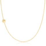 A yellow gold 14k Gold Asymmetrical Charm Necklace - Paw with a cable chain on a white background. 