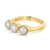 A Tres Pearl Ring on a white background. 