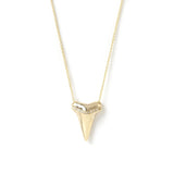 A Sharktooth Necklace with Diamond Ridge in yellow gold on a white background. 