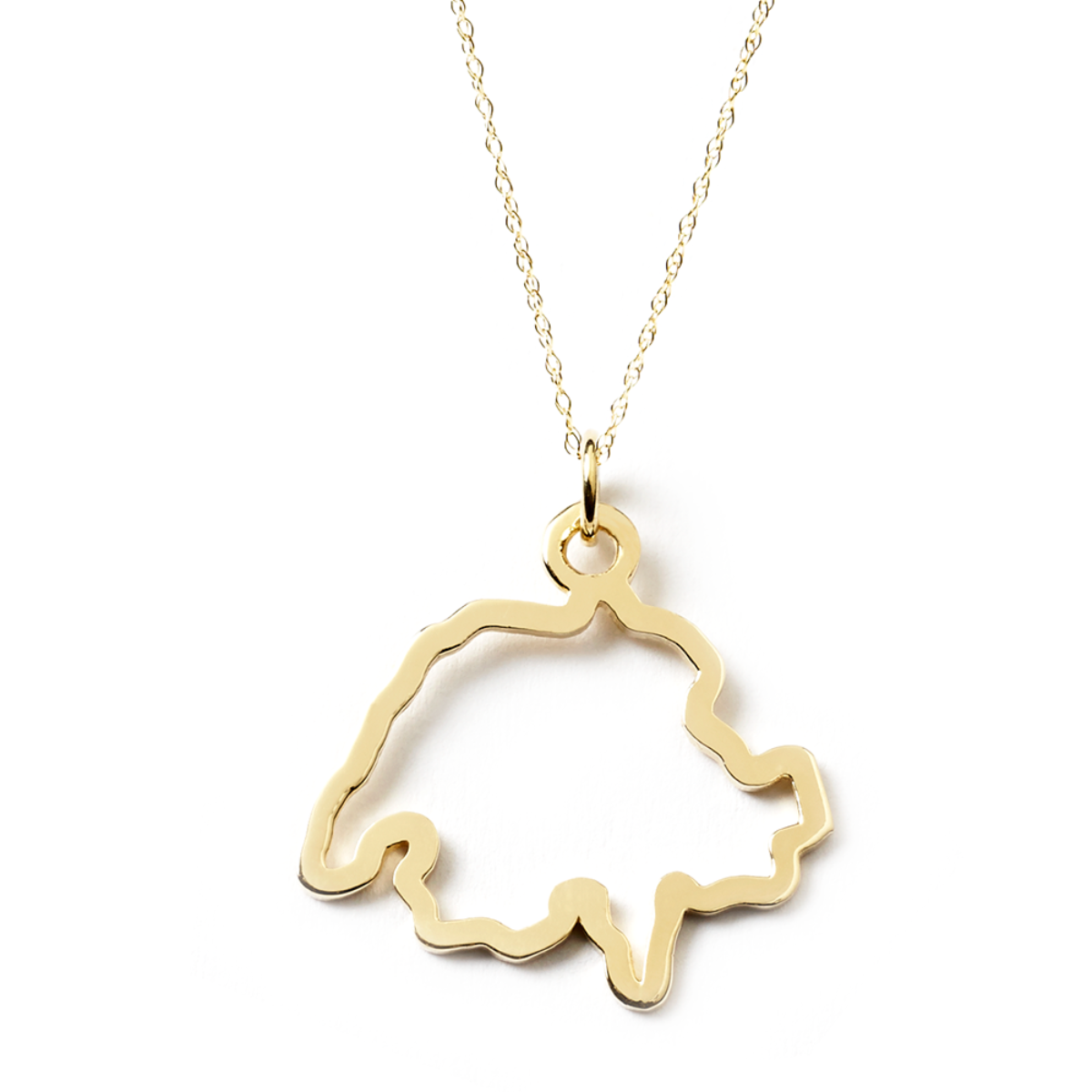 A Switzerland pendant necklace in yellow gold on a white background.