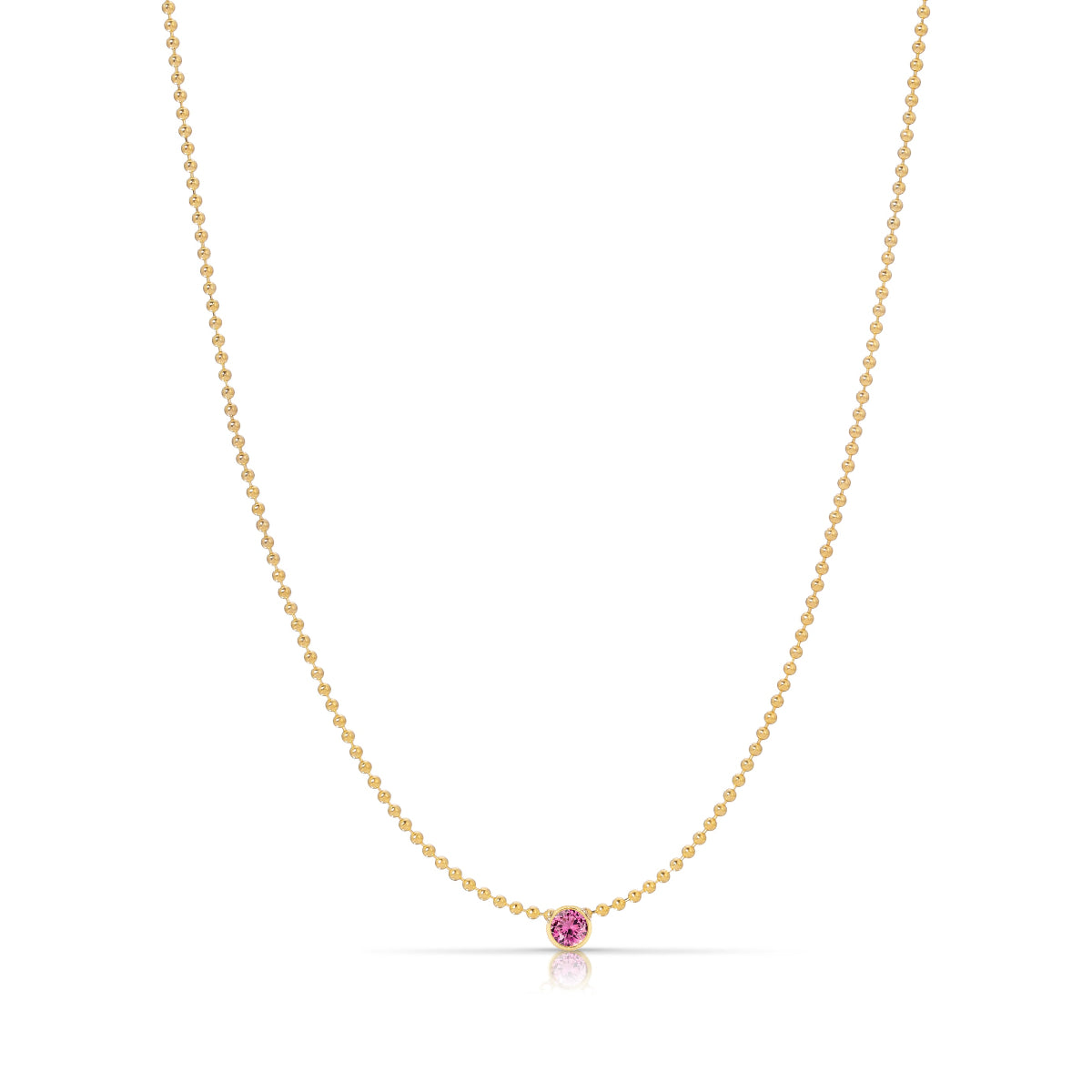 A Single Birthstone Layering Necklace - Yellow Gold in Pink Tourmaline - October on a white background.