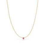 A Single Birthstone Layering Necklace - Yellow Gold in Pink Tourmaline - October on a white background.
