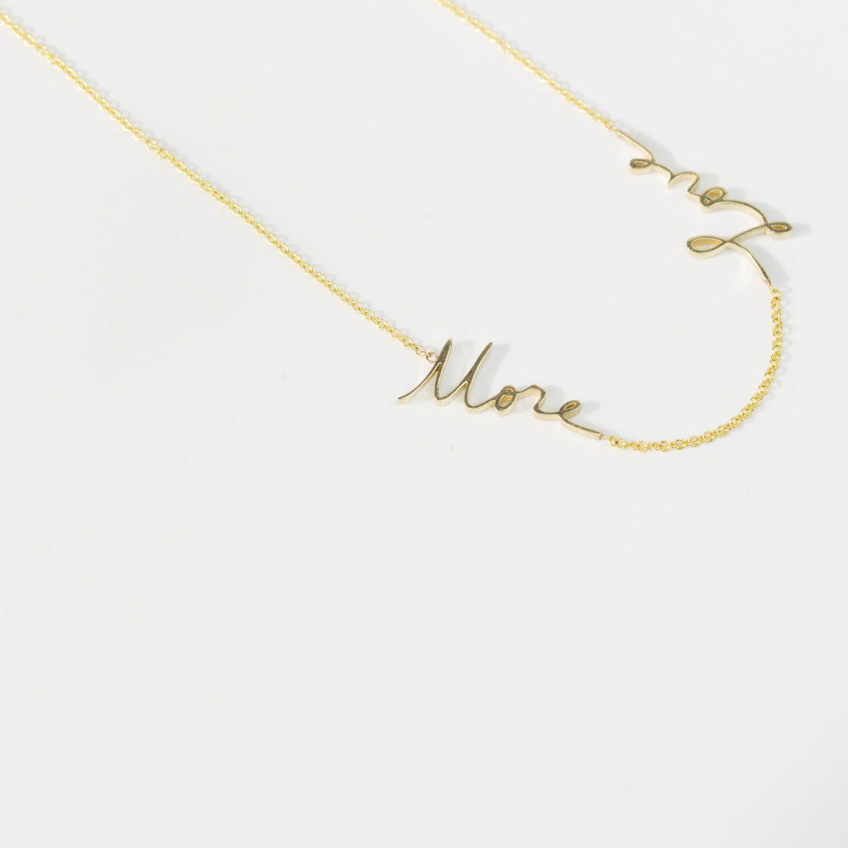 A More Love Necklace on a white background. 