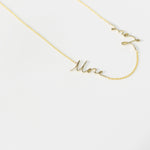 A More Love Necklace on a white background. 