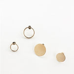 Two Open Eclipse Earrings (one small and one large) and two Solid Eclipse Earrings (one small and one large), all in yellow gold, on a white background.