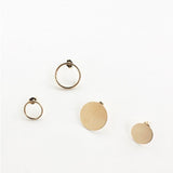 Two Open Eclipse Earrings (one small and one large) and two Solid Eclipse Earrings (one small and one large), all in yellow gold, on a white background.