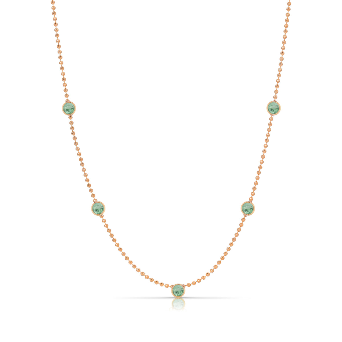 A Quintet Birthstone Layering Necklace - Rose Gold in Emerald - May on a white background.
