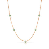 A Quintet Birthstone Layering Necklace - Rose Gold in Emerald - May on a white background.