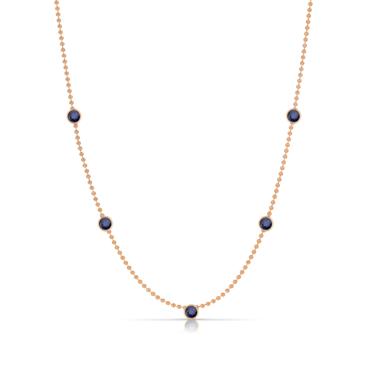 A Quintet Birthstone Layering Necklace - Rose Gold in Sapphire - September on a white background.