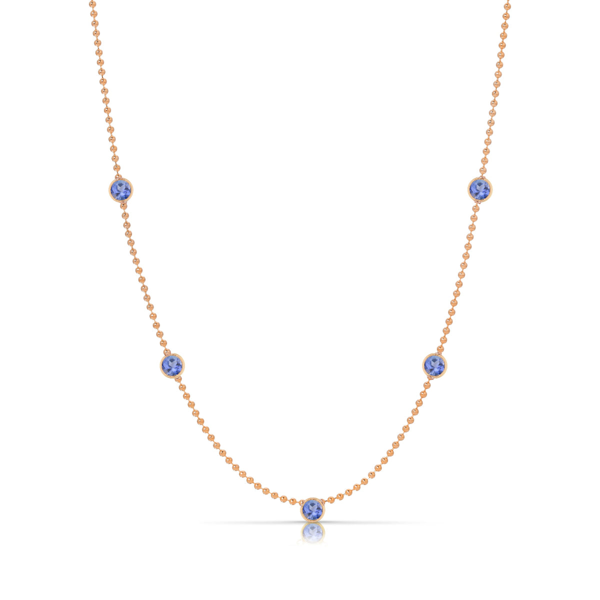 A Quintet Birthstone Layering Necklace - Rose Gold in Tanzanite - December on a white background.