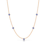 A Quintet Birthstone Layering Necklace - Rose Gold in Tanzanite - December on a white background.