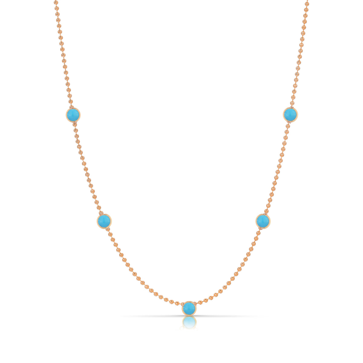 A Quintet Birthstone Layering Necklace - Rose Gold in Turquoise - December on a white background.