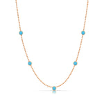A Quintet Birthstone Layering Necklace - Rose Gold in Turquoise - December on a white background.