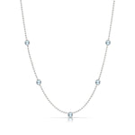 A Quintet Birthstone Layering Necklace – White Gold in Aquamarine – March on a white background.