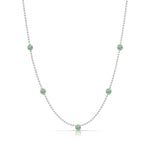 A Quintet Birthstone Layering Necklace – White Gold in Emerald – May on a white background.