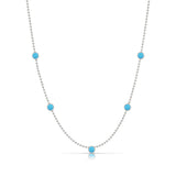 A Quintet Birthstone Layering Necklace – White Gold in Turquoise – December on a white background.