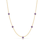 A Quintet Birthstone Layering Necklace - Yellow Gold in Amethyst - February on a white background.