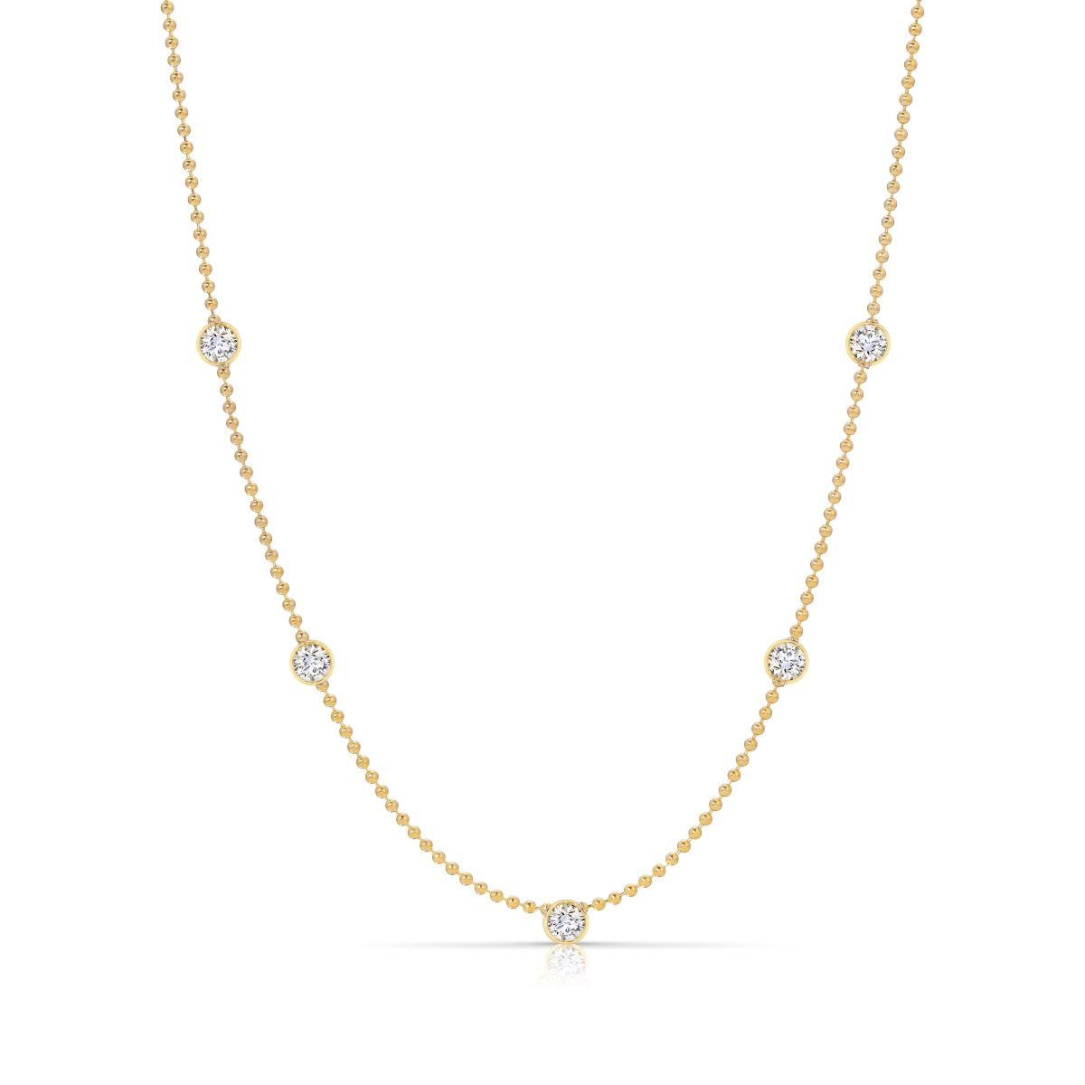 A Quintet Birthstone Layering Necklace - Yellow Gold in Diamond - April on a white background.