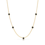A Quintet Birthstone Layering Necklace - Yellow Gold in Onyx - August on a white background.