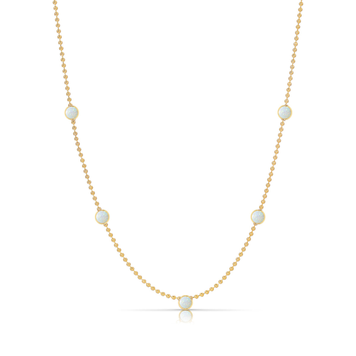 A Quintet Birthstone Layering Necklace - Yellow Gold in Opal - October on a white background.