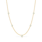 A Quintet Birthstone Layering Necklace - Yellow Gold in Opal - October on a white background.