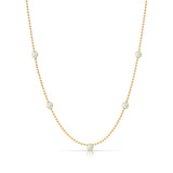 A Quintet Birthstone Layering Necklace - Yellow Gold in Opal - October on a white background.