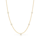 A Quintet Birthstone Layering Necklace - Yellow Gold in Pearl - June on a white background.