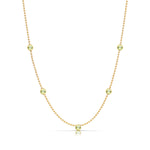 A Quintet Birthstone Layering Necklace - Yellow Gold in Peridot - August on a white background.