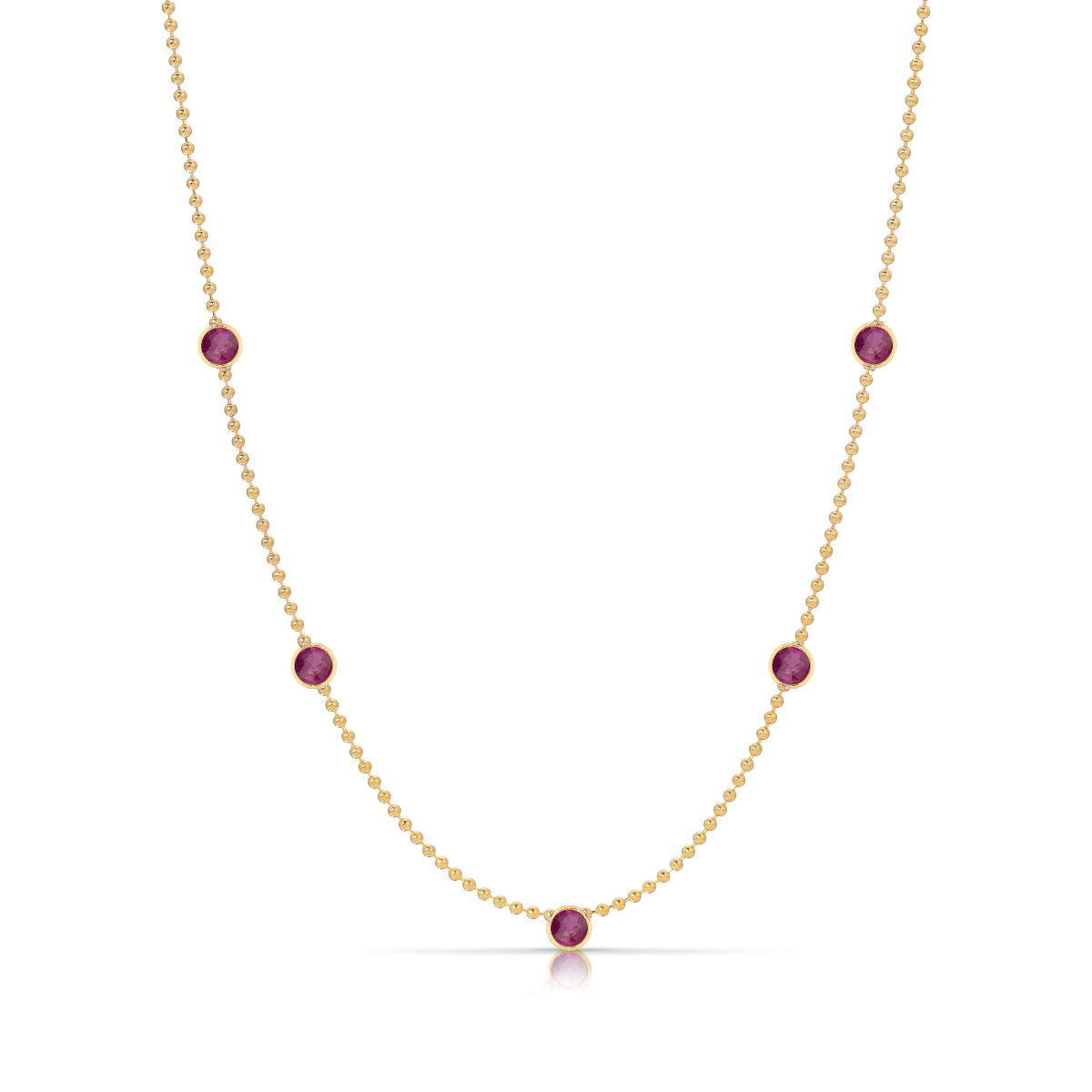 A Quintet Birthstone Layering Necklace - Yellow Gold in Ruby - July on a white background. 