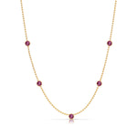 A Quintet Birthstone Layering Necklace - Yellow Gold in Ruby - July on a white background. 